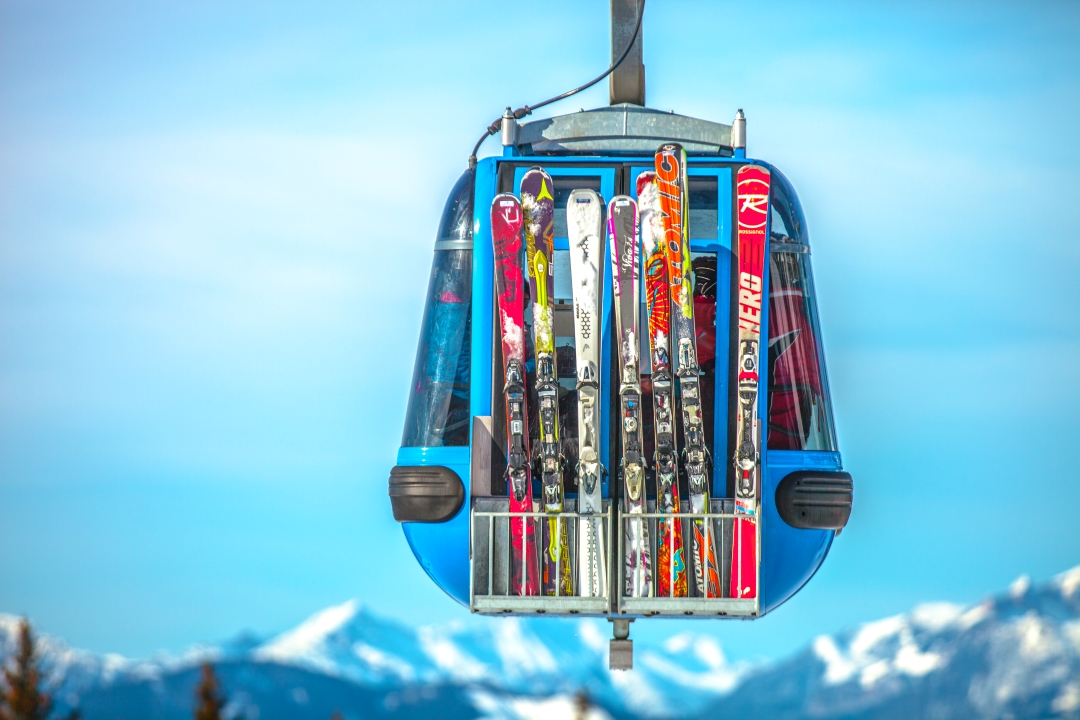 skiis in ski resort cable car