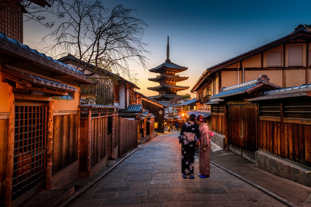 women standing in japanese street