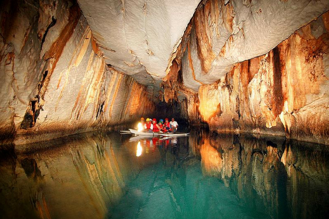 boat in puerto princesa cave in the philippines