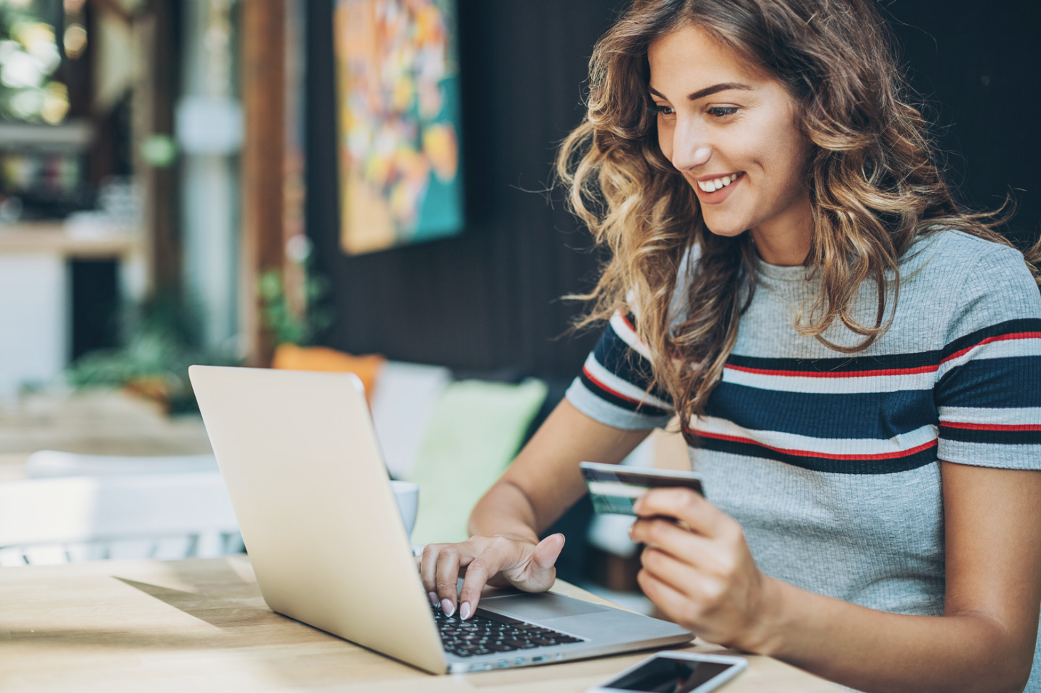 woman making payment on laptop online