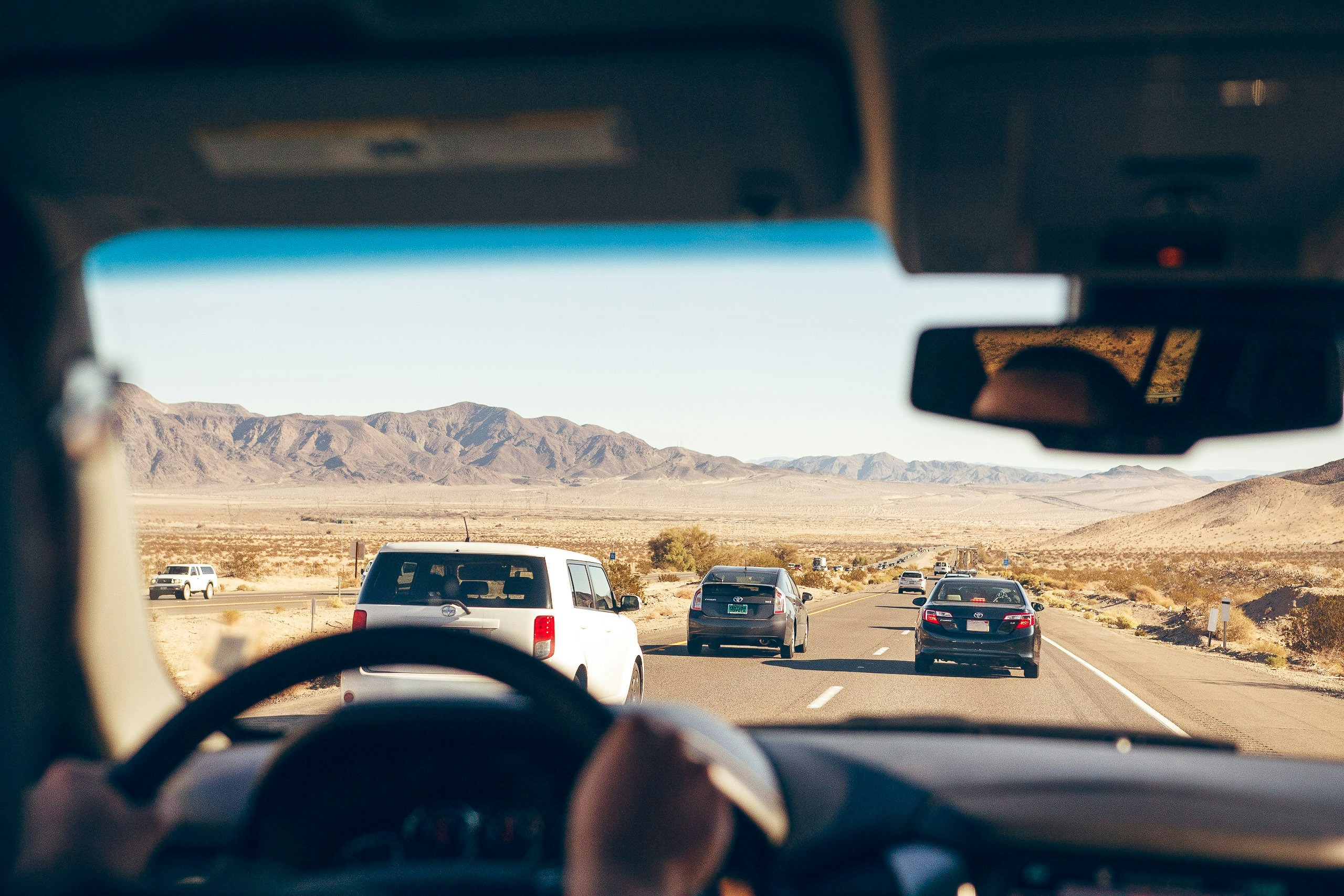 windshield view of person driving a car