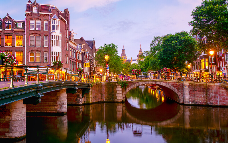 canal houses at night Netherlands